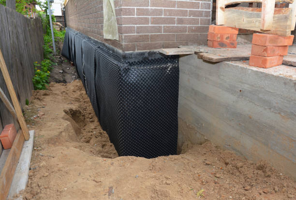 SJ Waterproofing Pros technician performing targeted Foundation Crack Repair assessment in Champlin, MN